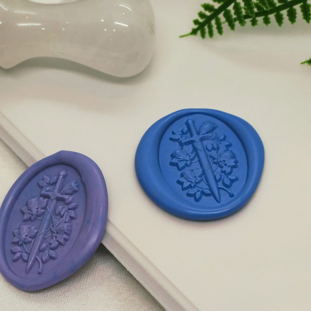A 3D relief sword with roses wax stamp from AMZ Deco.